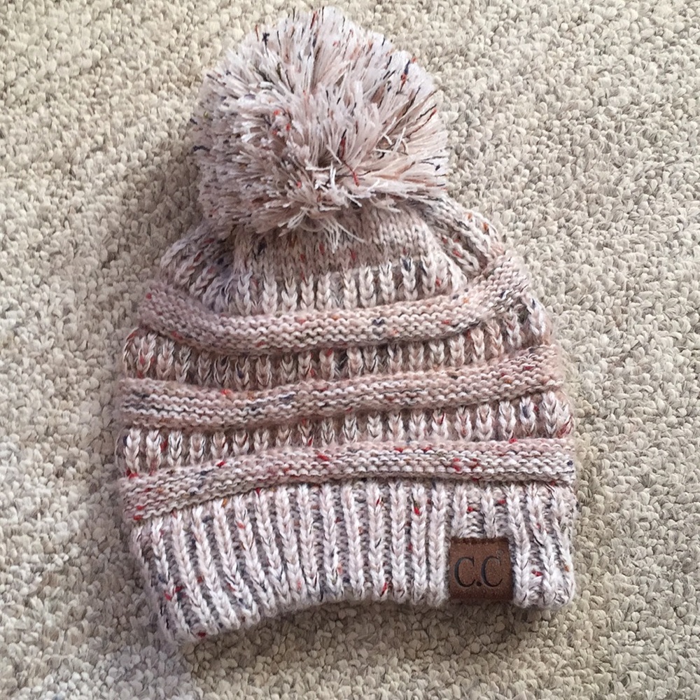 C.C hat with pom